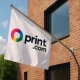 Een uitgebreide blik op gevelvlaggen en de voordelen van Print.com